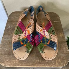 Beautiful And Handmade From Mexico! Colorful Leather Straps. Slip On Style With Back Ankle Security. These Are Like New Condition If Not Brand New. Would Be Amazing This Summer With Dresses Or Shorts! Mexico Size 5, Which Is A Us 8. Vacation Woven Leather Huarache Sandals With Open Toe, Vacation Woven Leather Huarache Sandals, Vacation Open Toe Woven Leather Huarache Sandals, Bohemian Woven Leather Beach Sandals, Bohemian Woven Leather Sandals For Beach, Casual Summer Huaraches Fair Trade, Summer Casual Fair Trade Huaraches, Casual Fair Trade Summer Huaraches, Bohemian Woven Leather Huarache Sandals For Vacation