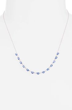 Oval-cut blue sapphires are interspersed between sparkling diamonds along the 14-karat white-gold chain of an elegant necklace perfect for your next event. Total sapphire weight: 4.36ct. Total diamond weight: 0.26ct. Color: G–H Clarity: SI1–I1 14k gold/blue sapphire/diamond Imported >Diamond Guide Blue Oval Diamond Necklace In Fine Jewelry Style, Blue Oval Diamond Necklace Fine Jewelry, White Gold Tanzanite Necklace With Diamond Accents, White Gold Tanzanite Necklaces With Diamond Accents, Sapphire Diamond Necklace, White Gold Chains, Diamond Guide, Blue Sapphire Diamond, Elegant Necklace