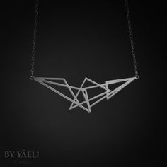 Triangle necklace – Beautiful geometric cluster of triangle necklace, its bound to be loved by the modern gal who loves fashion and minimalist design. ★ Comes in our signature gift box, ready for gift giving. ★ Available in Silver [Sterling silver chain & silver plated pendant] ★ Pendant size is 0.90"x2.80" . Thanks for shopping ... Minimalist Geometric Sterling Silver Necklace, Modern Silver Geometric Necklace, Silver Triangle Necklace For Gift, Minimalist Silver Triangle Necklace, Geometric Sterling Silver Jewelry In Silver, Minimalist Sterling Silver Triangle Necklace, Modern Silver Geometric Jewelry, Geometric Silver Necklace For Gift, Silver Geometric Necklace For Gift