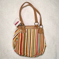 Colorful Striped Bucket Bag Rosetti New York, New With Tags, Tote Style Shoulder Bag, Tan Leather Straps With Silver Hardware, Has A Clasp To Keep Midsection Closed, 1 Velcro Pocket & 1 Zipper Pocket Inside Length 8 In. Width 7 In. Height 10 In. Medium Sized Purse New Bag, Silver Hardware, Tan Leather, Leather Purses, Inside Pocket, Bucket Bag, Zipper Pocket, Leather Straps, Bag Lady