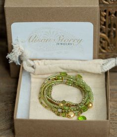 PERIDOT WRAP BEADED BRACELET / AUGUST BIRTHSTONE Take your personal style to the next level with this gorgeous peridot wrap bracelet. A bezel set peridot pendant is strung with tiny faceted peridots, gemstones and seed beads to create this piece. Designed to be wrapped around the wrist seven times or worn as a long necklace, this is the perfect addition to any outfit. YOU CAN SELECT YOUR SIZE FROM THE DROP DOWN MENU. FACTS ABOUT PERIDOT: Peridot is the birthstone of August. Qualities of peridot: Stackable Peridot Jewelry As Gift, Stackable Peridot Jewelry Gift, Stackable Green Beaded Bracelets As Gift, Green Stackable Beaded Bracelets As Gift, Green Bracelet Jewelry For Birthday Gift, Green Bracelet For Birthday Gift, Green Stackable Bracelets For Gift, Green Stackable Bracelets Gift, Adjustable Peridot Bracelets For Gifts