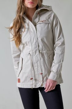 With a full front zip and a classic fit, the Longrider 2 Anorak is a stylish addition to any closet. An adjustable hood, buttoned cuffs and flap pockets make practical additions to this classic design while the draw cord waist allows for an adjustable fit to flatter any figure. Fabric: 97% Cotton | 3% Spandex Fit: Drawcord at Waist to Adjust Fit Details: Ladies Anorak Jacket Zip Front with Drawcord Hood and Two Front Button Pockets Available Colors: Frost Grey, Dark Sage, Sand Note: Kimes Ranch, Dark Sage, Fit Details, Anorak Jacket, Flap Pocket, Classic Design, Jackets For Women, Spandex, Grey