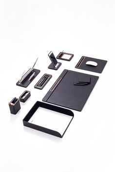 various office supplies laid out on a white surface