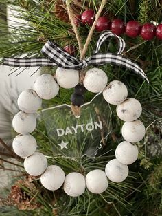 a christmas ornament hanging from a tree