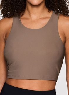 With a versatile design that effortlessly takes you from studio to street, you don't have to choose between fashion and performance with our Studio to Street Ribbed Bra Tank. Four-way stretch ottoman ribbed fabric complements a racerback design for optimal comfort and breathability, while a dual-purpose tank top/sports bra design features a low support built-in shelf bra plus removable foam padding for added support. Perfect as a cropped tank top with your favorite jeans or paired with yoga legg Bra Design, Sports Bra Design, Studio Session, Bra Tank, Plus Size Shopping, Built In Shelves, Hats For Sale, Shelf Bra, Ankle Pants