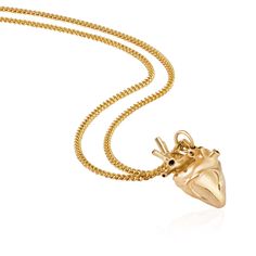 Rock and Roll meets refined craftsmanship in Strange Fruit's signature Anatomical Heart, scaled down in this more delicate edition. Hand carved and cast in solid 9k gold, and suspended on a 55cm 9k chain. Strong chemicals and perfumes should be avoided wherever possible as with all jewellery. Storing carefully will also prevent the metal from becoming dented and scratched over time. Heart-shaped Yellow Gold Brass Necklace, Heart Shaped Yellow Gold Brass Necklace, Yellow Gold Heart-shaped Brass Necklace, Yellow Gold Brass Necklace With Heart Charm, Gold Plated Heart Pendant Necklace With Polished Finish, Recycled Yellow Gold Heart Pendant Jewelry, Yellow Gold Recycled Gold Heart Pendant Jewelry, Engraved Yellow Gold Plated Heart Necklace, Luxury Heart-shaped Jewelry With Delicate Chain