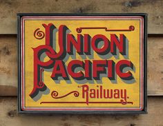 the union pacific railway sign is painted on wood