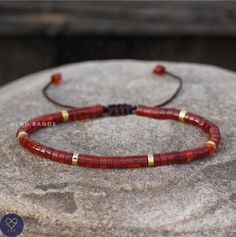 This delicate adjustable bracelet makes a wonderful gift for yourself, friend or loved one. The wax rope expands to easily slip onto any sized wrist and can be tightened to fit.             Size is approx 6,9 inches.  Red agate imparts a sense of stability and sheds light on the areas of your life where there might be some weaknesses. Its meaning is tied also to passion, self-love, and perseverance       Please note: All natural stone will have slight color difference. Each stone is unique in it Spiritual Friendship Bracelets With Round Beads, Resizable Spiritual Friendship Bracelets With Beads, Spiritual Resizable Friendship Bracelets With Round Beads, Adjustable Gemstone Beads Friendship Bracelets For Healing, Dainty Adjustable Beaded Bracelet, Adjustable Beaded Bracelets With Sliding Knot As Gift, Adjustable Hand Wrapped Minimalist Bracelets, Dainty Adjustable Friendship Bracelets With Round Beads, Minimalist Adjustable Hand Wrapped Bracelets