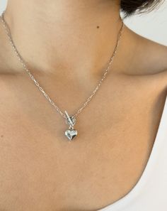 Edgy Aesthetic x Romantic Vibe = This 3D chrome heart necklace. Wear alone or stack it up for an even more unique look. Pair it with the matching bracelet for the perfect set. Details: Metal: Sterling Silver with Rhodium Plating & Anti-Tarnish Coating Pendant: 10.79 x 11.60mm Length: 17" Chain Toggle Clasp Silver Tarnish-resistant Heart Necklace For Everyday, Silver Double Heart Necklace Tarnish Resistant, Silver Jewelry With Heart Charm For Everyday, Silver Heart Necklace Tarnish Resistant, Silver Tarnish-resistant Double Heart Necklace, Silver Tarnish-resistant Heart Necklace, Tarnish-resistant Silver-tone Heart Necklace, Silver Double Heart Jewelry With Chain, Silver Heart Pendant Jewelry For Everyday