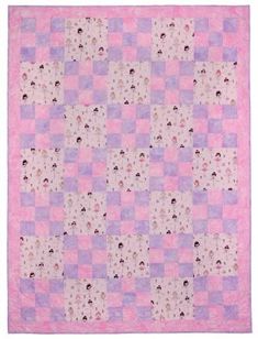 a pink and purple quilt with small squares on the front, two rows of smaller squares at the center