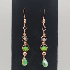 Nwt. Dangling Hook Earrings With Green Beads On A Copper Color. Earrings Measure 2.5" Wire Wrapped Czech Glass Drop Earrings, Czech Glass Beaded Drop Earrings, Copper Beaded Dangle Earrings As Gift, Copper Beaded Dangle Earrings, Green Metal Beaded Drop Earrings, Copper Beaded Teardrop Earrings For Gifts, Teardrop Copper Beaded Earrings For Gift, Copper Dangle Earrings For Party, Elegant Copper Beaded Nickel-free Earrings