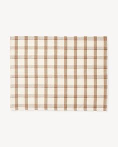 a tan and white checkered placemat