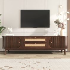 Description: Our beautiful and elegant rattan TV cabinet adds timeless elegance to your living space. Designed with attention to detail, this beautiful piece of furniture will add a warm and natural feel to your home. The combination of brown and warm wood tones gives your room a harmonious look that can be easily integrated into different interior styles. Specifications: Dimension of Overrall Product: 66.93'' * 15.55'' * 18.11'' Weight of Overrall Product: 65.26lbs Capacity: Overrall:110.23lbs/ Farmhouse Media Console, Curved Tv Stand, Rattan Tv Stand, Farmhouse Tv Stand, Console Tv, Solid Wood Cabinets, Solid Wood Doors, Mobile Tv, Tv Stands And Entertainment Centers