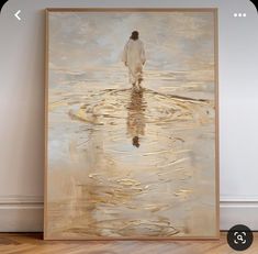 a large painting with a person standing in the water