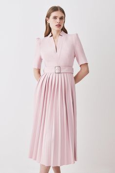 Called the Forever dress for a reason, this Structured Crepe midi style suits all kinds of special occasions. Designed to outlast trends and seasons, it shows off a notched neckline, elbow-length sleeves and pressed pleats. It buckles neatly at the waist with a matching fabric belt and makes a style-savvy choice for spring weddings, work days or balmy after-dark drinks.This is a limited edition piece, created as one of just 150 styles.This garment is part of our READY FOR THE FUTURE rangeIt is Karen Millen Dress, Notched Neckline, Spring Weddings, Belted Midi Dress, Style Savvy, Dresses Ideas, Tailored Dress, Pleated Midi Dress, Elbow Length Sleeve