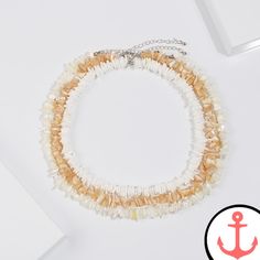 Enhance Your Nautical Style with the Puka Shell Necklace Step up your nautical jewelry game with our exquisite Puka Shell Necklace. As passionate sea lovers ourselves, we understand the allure of marine symbols and their ability to transport you to the depths of the ocean. This stunning necklace from our Shell Necklace collection is a must-have accessory for any woman who adores the sea. Features of the Puka Shell Necklace based on Existing Product Content Made from genuine puka shells, each nec White Shell Jewelry With Ocean-inspired Style, White Shell-shaped Ocean-inspired Jewelry, Ocean-inspired White Shell-shaped Jewelry, White Strand Necklace With Lobster Clasp, White Shell-shaped Ocean-inspired Necklace, White Ocean-inspired Jewelry For Vacation, White Ocean-inspired Shell-shaped Necklace, Ocean-inspired White Shell-shaped Necklace, White Shell Necklace With Clavicle Chain For Beach