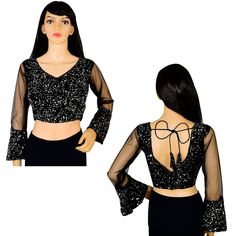 Item Description Beautiful Women's Velvet Sequins V-Neck Net Sleeves Ethnic Designer Blouse Fabric:-Velvet Sequins Color:-Black Sale For:-1 Blouse Closure Type:-Back Hook & Eye With Dori Sleeves Type:-3/4 Sleeves Neck Style:-V-Neck Product:-Padded Blouse With Cotton Inner Lining Care Instructions:-Hand Wash or Dry Clean Only Disclaimer:-The Actual Color Of The Product Slightly Vary From The Image Due To Photographic Light Or Monitor's Display. Measurement Sleeves Length:-21.5 Inch Front Neck Depth :-8 Inch Back Neck Depth :-11.5 Inch Ethnic Sequins Work Velvet Designer Blouse Net Sleeves To Give Yourself A Splendid Traditional Makeover! A Perfect Match For Your Grand Sarees.Pair This Ready To Wear Blouse With Any Type Of Saree In Various Occasions.This Would Be Classy Yet Fashionable Choic Festive V-neck Georgette Blouse Piece, Festive Georgette V-neck Blouse Piece, Fitted V-neck Anarkali Sets, Traditional V-neck Sharara For Party, Party V-neck Georgette Saree, Semi-stitched V-neck Saree For Party, Festive V-neck Sequin Sets, V-neck Traditional Wear With Pallu For Party, Party V-neck Traditional Wear With Zari Work