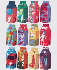 an assortment of colorful milk cartons on a white background