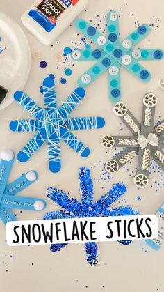 the snowflake sticks are being used to make an ornament