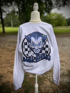 "\"Blue Devils\" -Professionally DTG Printed  -Unisex True To Size Fit Sweatshirt  -Shirts are made to order. Please Allow 1-2 weeks processing time  - I do not offer Returns, Order Cancelations or Refunds -Size chart is listed in item photos!" Blue Relaxed Fit Pre-shrunk Sweatshirt, Blue Tops For Fall Fan Merchandise, Relaxed Fit Blue Pre-shrunk Sweatshirt, Cotton Long Sleeve Tops For Fan Merchandise, Blue Fan Apparel T-shirt For Fall, Blue School Spirit Tops For Fall, Blue Crew Neck Sweatshirt For Fan Merchandise, Gray Long Sleeve Fan Apparel Top, Blue Tops For Fall School Spirit