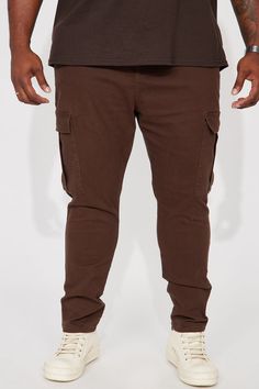 Available In Dark Brown. Button Closure Zip Fly Draw Cord In Waistband Front Pockets Cargo Pockets Back Pockets Slim Fit 32 Inseam 98% Cotton 2% Spandex Imported | Mens Kyle Slim Cargo Pants in Dark Brown size 30 by Fashion Nova Stretch Brown Cargo Pants With Pockets, Stretch Brown Cargo Pants With Cargo Pockets, Stretch Brown Bottoms With Cargo Pockets, Brown Stretch Cargo Bottoms, Stretch Brown Cotton Cargo Pants, Stretch Cotton Brown Cargo Pants, Brown Stretch Cotton Cargo Pants, Slim Cargo Pants, Brown Fashion