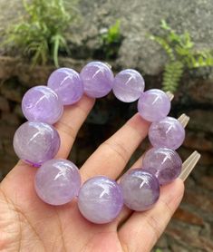 Material:Amethyst Quartz beads size : 21- 20mm quantity: one strand  6mm approx 29 pcs one strands 7mm approx25 pcs one strands 8mm approx 22 pcs one strands 9mm approx 21pcs one strands 10mm approx 19 pcs one strands 11mm approx 18pcs one strands 12mm approx 16 pcs one strands 13mm approx 16 pcs one strands 14mm approx 15 pcs one strands 15mm approx 14pcs one strands 16mm approx 14 pcs one strands 17mm approx 13pcs one strands 18mm approx 13pcs one strands 19mm approx 12pcs one strands 20mm app Lavender Beaded Bracelets With Round Beads As Gift, Purple Stretch Bracelet With Round Beads As Gift, Purple Beaded Bracelets With 8mm Beads, Stretch Bracelet With Large Beads As A Gift, Large Beads Stretch Bracelet Gift, Large Beads Stretch Bracelet As Gift, Large Beads Stretch Bracelet For Gifts, Healing Bracelets With Large Beads, Handmade Purple Beaded Bracelets