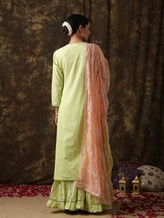 Ambika- Harita pistachio peach sharara set - Trendroots Pista Green Sharara With Resham Embroidery And Straight Kurta, Pista Green Palazzo Set With Gota Work, Pista Green Sharara With Resham Embroidery, Pista Green Sharara With Resham Embroidery And Traditional Drape, Pista Green Sharara With Dabka Work, Pista Green Sharara With Dabka Work And Traditional Drape, Designer Pista Green Sharara With Dori Work, Unstitched Pista Green Sharara With Gota Work, Pista Green Palazzo Set With Mirror Work