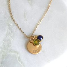 This special charm necklace is created with a mama and dainty birthstone charms. Available in silver or gold necklace options, this necklace is perfect for everyday and makes a unique gift for mom on Mother's Day!•6mm genuine natural birthstone•Choose up to 5 birthstones •12mm mama disc •100% 14kt Gold-Filled or Sterling Silver •A high quality delicate link chain with a spring clasp.•Polished to a light satin finish.•Great versatile design for everyday wear. Mama Necklace, Unique Gifts For Mom, Gem Necklace, Mom Jewelry, Birthstone Gifts, Mom Necklace, Birthstone Charms, Dainty Necklace, Personalized Necklace