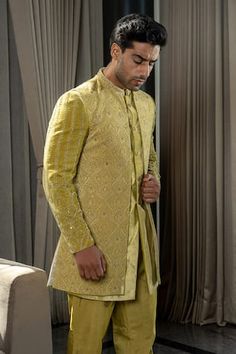 Gold, yellow jodhpuri jacket with thread, zardozi, sequin embroidery in floral pattern. Paired with sherwani and narrow pant. - Aza Fashions Designer Yellow Bandhgala Straight Kurta, Yellow Designer Wear Sherwani Straight Kurta, Pista Green Nehru Jacket For Designer Wear, Designer Pista Green Sherwani With Chikankari Embroidery, Festive Pista Green Nehru Jacket For Designer Wear, Designer Yellow Sherwani For Eid, Yellow Sherwani With Dabka Work For Designer Wear, Designer Yellow Sherwani With Dabka Work, Pista Green Nehru Jacket With Chikankari Embroidery