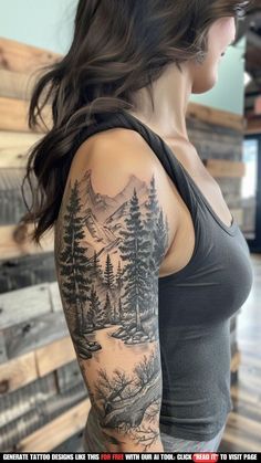 a woman with a forest scene tattoo on her arm and shoulder, standing in front of wooden planks