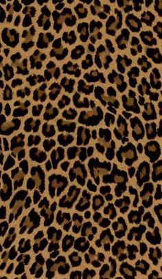 an animal print fabric with brown and black spots