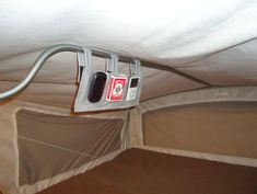 the inside of a tent that has been set up to be used as a bed