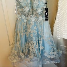 Rare Jvn By Jovani Beautiful Short Light Blue Dress Very Shiny , You Will Be A Star Among Everyone In This Dress ! Blue Lace Dress For Homecoming, Blue Lace Mini Dress For Prom, Blue Lace Mini Dress For Homecoming, Short Light Blue Dress, Blue Pearl Dress, Jovani Homecoming Dresses, Purple Formal Dress, Mini Gown, Fitted Party Dress