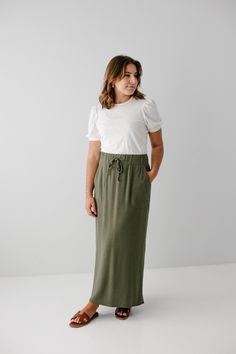 'Winslet' Waist Tie Maxi Skirt in Deep Olive Relaxed Maxi Skirt With Pockets For Daywear, Cotton Maxi Skirt With Elastic Waistband For Work, Relaxed Fit Solid Maxi Skirt With Pockets, Solid Maxi Skirt With Pockets In Relaxed Fit, Full Length Relaxed Fit Maxi Skirt With Side Pockets, Solid Maxi Skirt With Pockets And Relaxed Fit, Casual Maxi Skirt For Workwear, Linen Maxi Skirt With Pockets For Work, Full Length Skirts