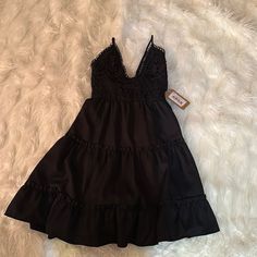 Black Baby Doll Dress Size Large (Missy Size) Adjustable Straps Tie Back Perfect For Vacay, Swim Cover, Summer Event Cute Black Sleeveless Mini Dress, Cute Black Mini Length Dresses, Cute Black Dress For Vacation, Black Ruffled Mini Dress For Vacation, Cute Black Mini Dress For The Beach, Cute Black Mini Dress For Beach, Casual Black Mini Dress With Lace Trim, Black Lace Mini Dress For Beach, White Floral Bodycon Dress