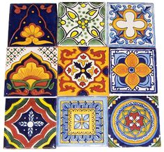 colorful tiles are arranged in the shape of squares, with different colors and designs on them