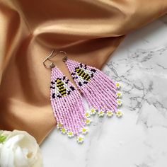 ❤Lovely pink bee and daisy earrings, perfect gift for your girlfriend. Long fringed earrings made from high quality Czech beads. ❤ Wrap hook stainless steel ❤ Length -3.6 inches (9 cm) Width - 1.2 inches (3 cm) ❤ DELIVERY The product will be manufactured and sent within 3-5 days. * After sending, I will send you a track code on which you can track the movement of your order. ❤ Write me a message if you have any questions. I reply within 24 hours. Cute Beaded Earrings For Gifts, Cute Beaded Earrings For Gift, Spring Drop Beaded Earrings Gift, Trendy Beaded Flower Earrings For Gifts, Pink Flower Beaded Earrings For Gift, Spring Gift Beaded Drop Earrings, Spring Beaded Drop Earrings For Gift, Pink Beaded Flower Earrings As Gift, Pink Beaded Flower Earrings For Gift