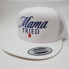 a white trucker hat with the word mama tried on it's front side