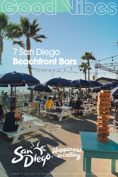 people sitting at beach chairs under umbrellas and palm trees with the words san diego beachfront bars