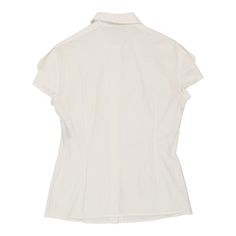 Description:Vintage white Versace short sleeve shirt, fits large.GENDER: womens CONDITION: good - small faint stain on right armpit, not visible when wearing.STYLE: short sleeve shirtERA: 1990sCOLOUR: whiteFABRIC: cotton blendNotes: Garment is labelled as an Italian size 44, and fits a women's large. Material blend is 90% cotton, 10% polyamide. Classic White Short Sleeve Top For Summer, Fitted White Short Sleeve Top, Elegant Cotton Short Sleeve Shirt, Elegant Fitted White Short Sleeve Top, White Short Sleeve T-shirt For Work, White Fitted Short Sleeve Blouse, White Short Sleeve Tops For Daywear, Versace Shorts, White Short Sleeve Shirt