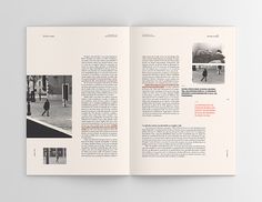 an open book with black and white photos on it's pages, showing people walking down the street