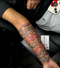 a person with a tattoo on their arm