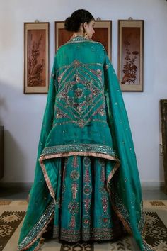 Teal green attached cancan lehenga with sequin, thread, cutdana, bead embroidery in floral stripe pattern. Paired with sweetheart neck embroidered padded blouse and fringe lace bordered dupatta. - Aza Fashions Green Chanderi Set For Reception, Green Sets With Zari Work For Reception, Green Raw Silk Sharara With Dori Work, Green Raw Silk Anarkali Set For Reception, Green Chanderi Gown For Reception, Green Anarkali Sharara For Reception, Green Sharara For Reception, Green Cutdana Lehenga For Wedding, Green Cutdana Gown For Reception