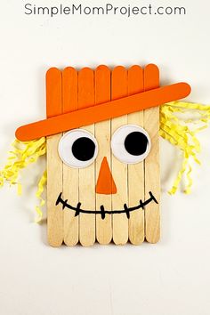 a popsicle scarecrow made out of wood sticks