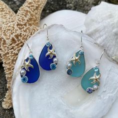 Sea Life Sea Glass Earrings – Cape Cod Jewelers Blue Sea Glass Dangle Jewelry, Blue Teardrop Sea Glass Earrings, Elegant Blue Sea Glass Jewelry, Ocean-inspired Sterling Silver Dangle Earrings, Blue Teardrop Sea Glass Jewelry, Elegant Blue Starfish Charm Jewelry, Elegant Blue Jewelry With Starfish Charm, Blue Starfish Charm Earrings For Gift, Ocean-inspired Sterling Silver Drop Earrings