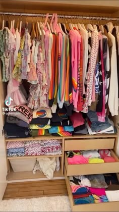 the closet is full of clothes and other things to buy for children's clothing