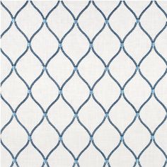 a white and blue rug with wavy lines on it