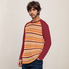 • 70s Style Shirt Men: Embrace the classic 70s fashion with this maroon and orange stripe shirt, a perfect addition to any retro wardrobe.• Vintage 70s Shirt Style: This shirt captures the essence of vintage 70s style, featuring bold stripes and a fun, nostalgic vibe.• Retro Shirt Men: Made from 95% jersey polyester and 5% spandex, this shirt offers comfort and style with long raglan sleeves in contrasting maroon color.•Stripe Shirt Men: Pair this stripe top with wide-leg jeans or bell bottoms for a super fun retro look, ideal for any fun occasion.Designed in California by Trendy Hip Buys. Made to order from overseas. • Fabric : Jersey(95% polyester and 5% spandex)• Regular fit• Crew neck, long sleeve, raglan sleeve• Fabric weight: 180g/m²**Care Instruction: machine wash cold with similar Casual Vertical Stripes Shirt For Fall, Retro Tops With Contrast Stripes For Fall, Retro Fall Tops With Contrast Stripes, Cotton Shirt With Vertical Stripes For Fall, Fall Cotton Shirt With Vertical Stripes, Cotton Tops With Vertical Stripes For Fall, Retro Brown T-shirt For Fall, Retro Tops With Vertical Stripes And Relaxed Fit, Retro Relaxed Fit Top With Vertical Stripes