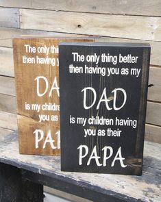 two wooden signs that say dad is my children having papa and the only thing better than having