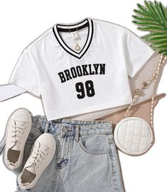 Sporty Tops For Summer School, Sporty Summer Tops For School, Sporty Tops For School In Summer, Trendy Cotton Top For School, White School Spirit Top For Spring, Casual V-neck School Tops, Trendy Graphic Print Tops For School, Casual V-neck Tops For School, Trendy Spring School Top